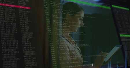 Image of data processing over caucasian female worker in server room. global technology and digital interface concept digitally generated image.の写真素材