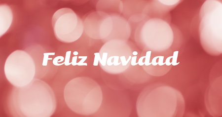 Image of feliz navidad text over red spots of light background. Christmas, tradition and celebration concept digitally generated image.の写真素材
