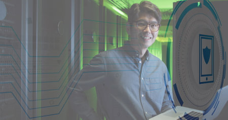 Image of data processing over asian male worker in server room. Global business and digital interface concept digitally generated image.の写真素材
