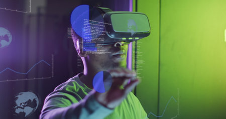 African american male it engineer in vr goggles and computer servers. Global computing and data...