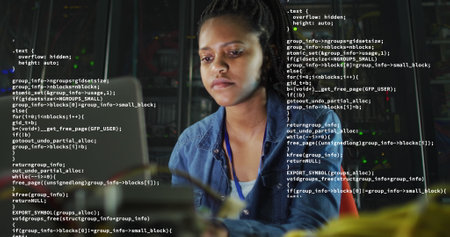 Image of data processing over african american businesswoman using laptop. Global business, finances...