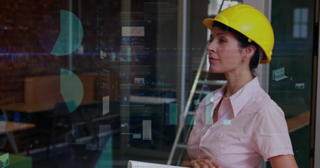 Female architect with business plans and interface codes.の写真素材
