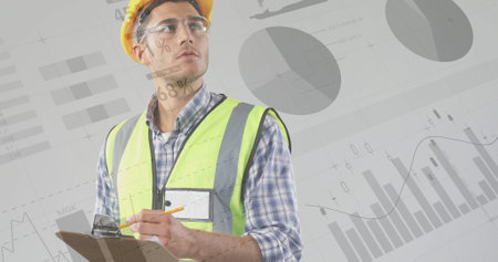 Architect with clipboard and foreground graphs.
