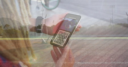 Image of woman holding smartphone with covid 19 vaccination passport over runner. global covid 19 pandemic and vaccination concept digitally generated image.の写真素材