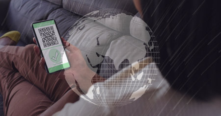 Image of woman holding smartphone with covid 19 vaccination passport over globe. global covid 19...