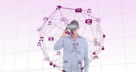 Image of digital interface with icons and globe of network of connections with man wearing VR...