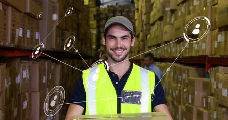 Image of network of conncetions with icons over caucasian male worker warehouse. Global conncetions,...