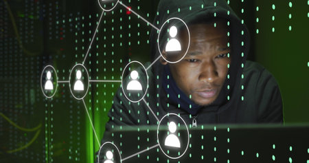 Image of icons and data processing over african american male hacker using laptop. Global digital...