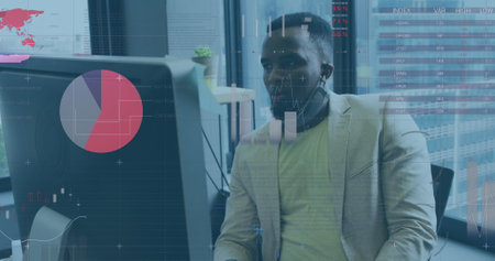 Image of financial data processing over businessman with face mask using computer in office. global...