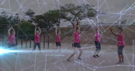 Image of shapes over diverse women at obstacle course exercising. Global sport, health, fitness and...