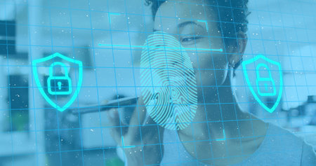 Image of data processing over african american businesswoman using smartphone in office. Global...