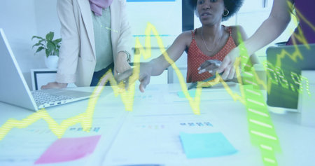 Image of financial data processing over diverse business people in office. Global business, finance,...