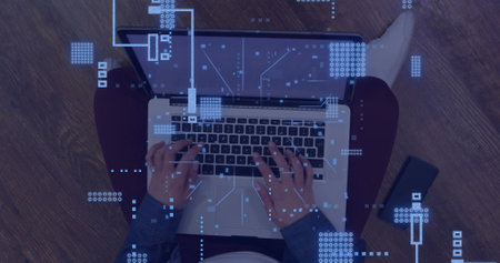 Image of circuit board with data processing over caucasian man using laptop. Global connections,...