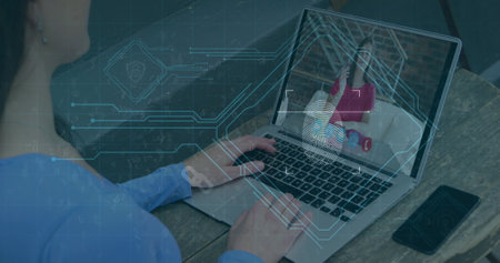 Image of computer circuit board elements over woman using laptop on image call. Digital interface...