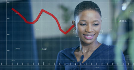 Image of financial data processing over african american businesswoman working in office. Global...