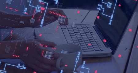Image of circuit board with data processing over caucasian man using laptop. Global connections, computing, digital interface and data processing concept digitally generated image.の写真素材