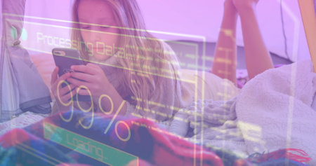 Image of data processing on screen over woman using smartphone. global communication, digital interface, technology and networking concept digitally generated image.の写真素材