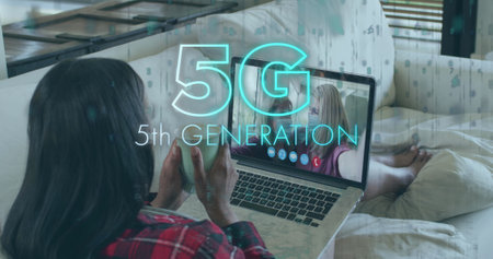 Image of 5g 5th generation text over woman using laptop on image call in background. Digital...