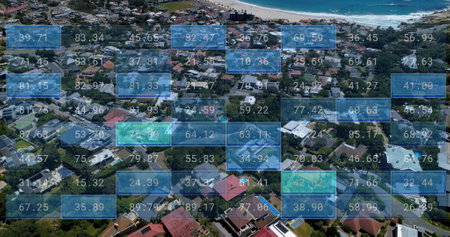 Image of financial data processing over cityscape. Global business, finances, computing and data processing concept digitally generated image.の写真素材