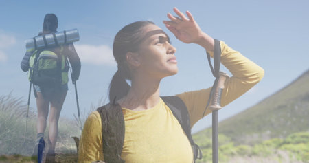 Composite of woman hiking in countryside, and admiring the view from mountain. health, fitness and...