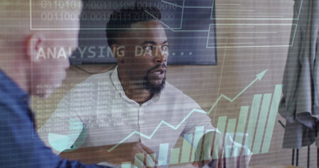 Image of data processing over diverse business people in office. Global business, finances, computing and data processing concept digitally generated image.の写真素材