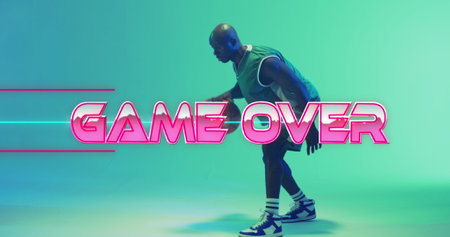 Image of game over text over neon pattern and african american basketball player. Sports,...