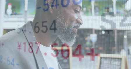 Image of financial data processing over african american man eating sandwich. global finance, business, communication and connection concept digitally generated image.の写真素材