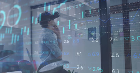 Image of financial data processing over businessman wearing vr headset in office. global business,...