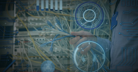 Image of data processing over hands of caucasian male engineer connecting wires. computers, network,...