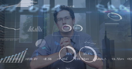Image of financial data processing over businessman in office. global business, finances,...