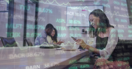 Image of financial data and graphs over biracial woman in office. Business, finance, economy,...