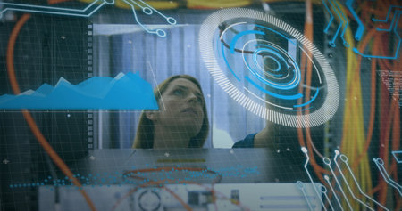 Image of data processing over caucasian female engineer connecting wires. computers, network, data...