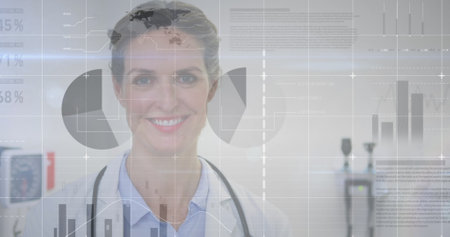 Image of statistical data processing over caucasian female doctor smiling at hospital. Medical healthcare and business data technology conceptの写真素材