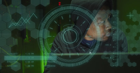 Image of data processing over african american male hacker in server room. Global business, security and digital interface concept digitally generated image.の写真素材