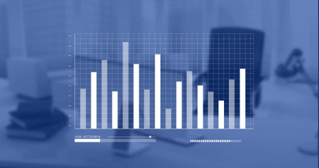 Image of financial data processing over computer on desk in office. Global business, finance, cloud computing and data processing concept digitally generated image.の写真素材