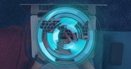 Image of scope scanning over caucasian businessman using laptop. Global connections, business, finances, computing and data processing concept digitally generated image.の写真素材