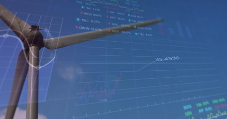 Wind turbine standing against clear sky, digital graphs overlaying. Transparent charts showing...