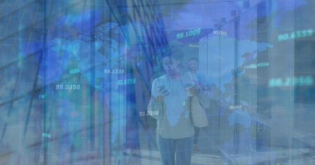 Image of numbers over world map against african american woman using smartphone at office. Global...