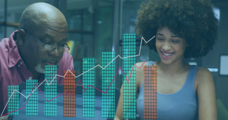 Image of financial data processing over diverse business people working in office. Global business, finances, computing and data processing concept digitally generated image.の写真素材