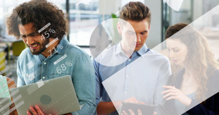 Image of statistical data processing over diverse colleagues using electronic devices at office. Computer interface and business data technology conceptの写真素材