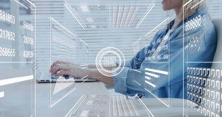 Image of financial data processing over caucasian businesswoman using laptop in office. Global...