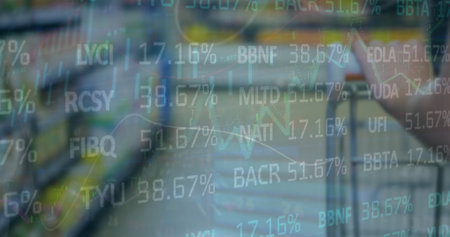 Image of financial data processing over shopping trolley. Global business, finances, computing and data processing concept digitally generated image.の写真素材