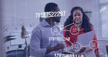 Image of connected icons, changing numbers and letters, diverse coworkers discussing reports. Digital composite, multiple exposure, communication, business, teamwork and technology concept.の写真素材