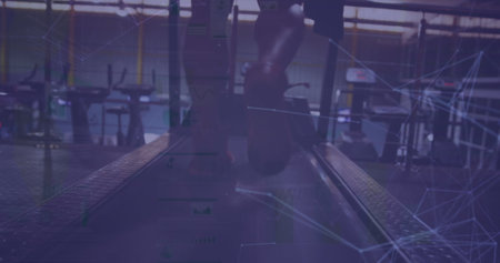 Image of dots connected with lines over low section of diverse people running on treadmills. Digital composite, multiple exposure, communication, training, health and fitness concept.の写真素材