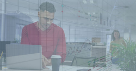 Image of graphs and trading board over biracial businessman with documents working over laptop....
