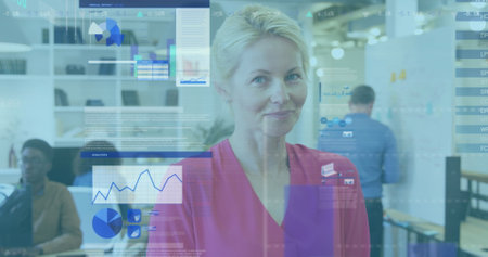 Image of statistical data processing over portrait of caucasian senior woman smiling at office. Computer interface and business data technology conceptの写真素材