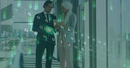Image of binary codes, illuminated pattern on keyboard, diverse couple discussing reports. Digital...