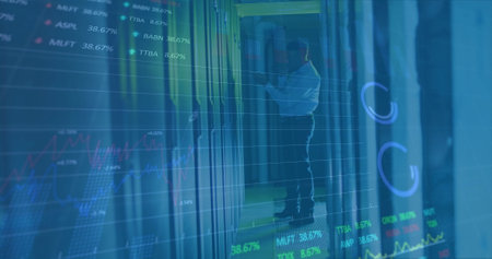 Image of infographic interface over african american male engineer examining data servers. Digital...