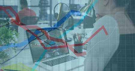 Image of infographic interface and caucasian woman discussing with man over image call in office....
