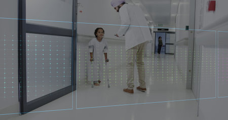 Image of heart rate monitor on diverse male doctor talking to disabled girl in hospital corridor....